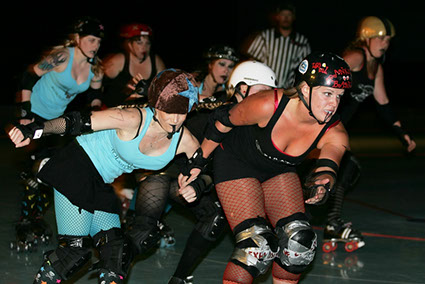 Photo of skaters during a contest at Chico Funland skating rink.